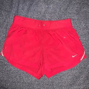 red nike shorts